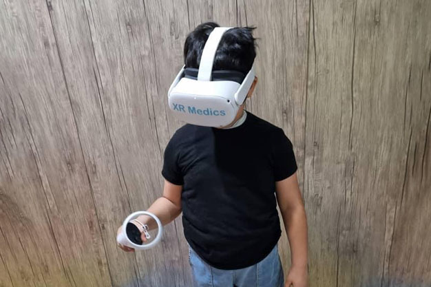 a child girl with VR device